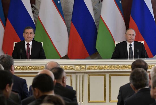 Russian President Vladimir Putin meets with President of Uzbekistan Shavkat Mirziyoyev