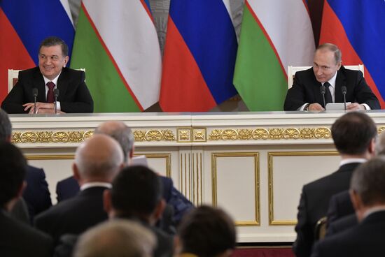 Russian President Vladimir Putin meets with President of Uzbekistan Shavkat Mirziyoyev