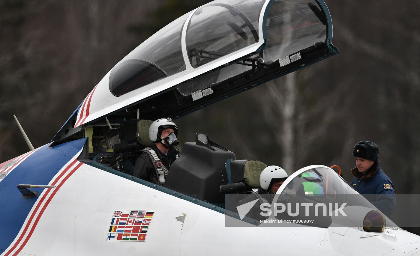 A Su-30SM multipurpose fighter jet of the Russian Knights aerobatic display team before a rehearsal of the Victory Day parade air show. Location: Russia, Moscow region, Kubinka. Author: Maksim Blinov/Sputnik. Rehearsal of Victory Day parade air show