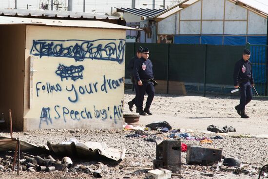 Aftermath of fire at migrant camp in France