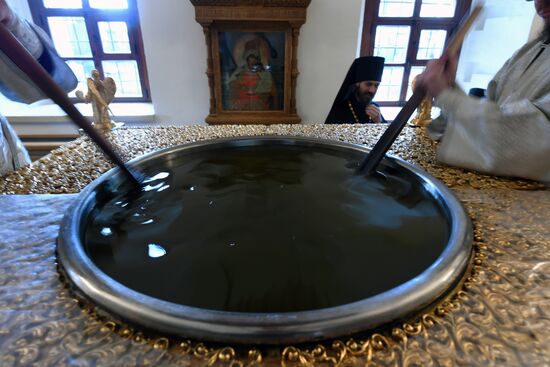 Completing the chrism-preparation rite