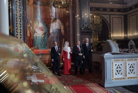 Russian President Vladimir Putin and Russian Prime Minister attend Easter service at Christ the Savior Cathedral