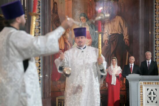 Russian President Vladimir Putin and Russian Prime Minister attend Easter service at Christ the Savior Cathedral