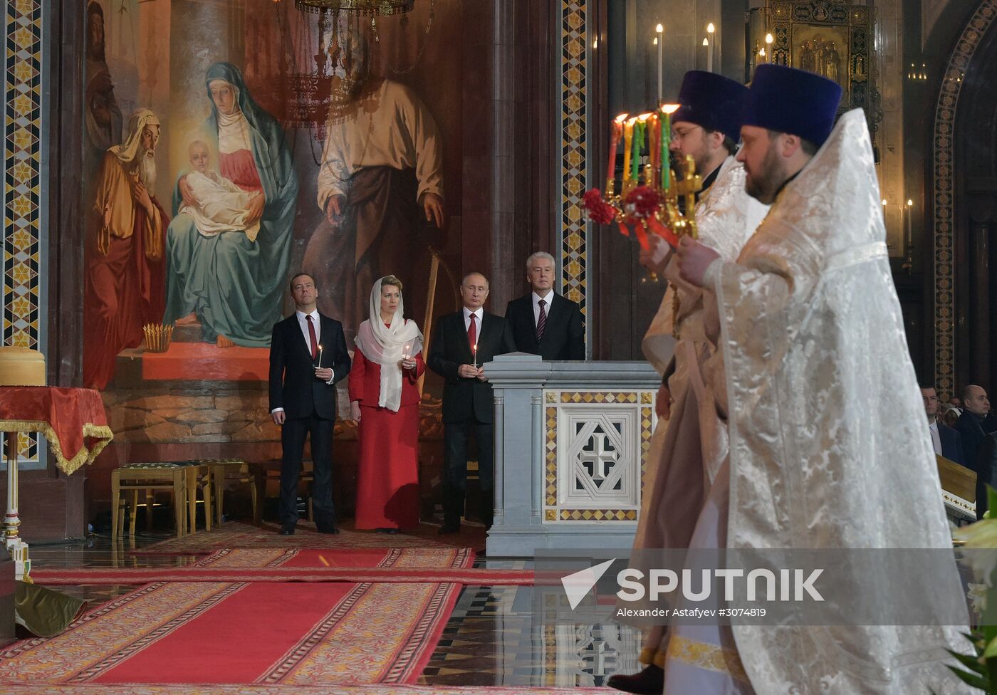 Russian President Vladimir Putin and Russian Prime Minister attend Easter service at Christ the Savior Cathedral