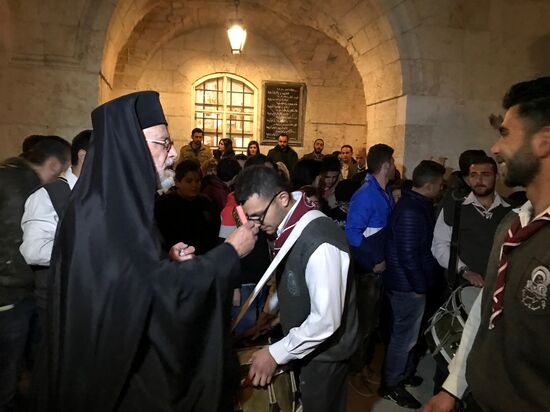 Easter service at church in Saidnaya, Syria