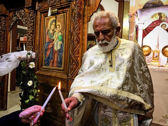 Easter service at church in Saidnaya, Syria