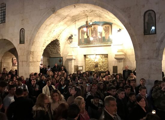 Easter service at church in Saidnaya, Syria