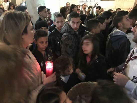 Easter service at church in Saidnaya, Syria