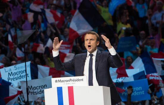 Emmanuel Macron meets with voters in Paris
