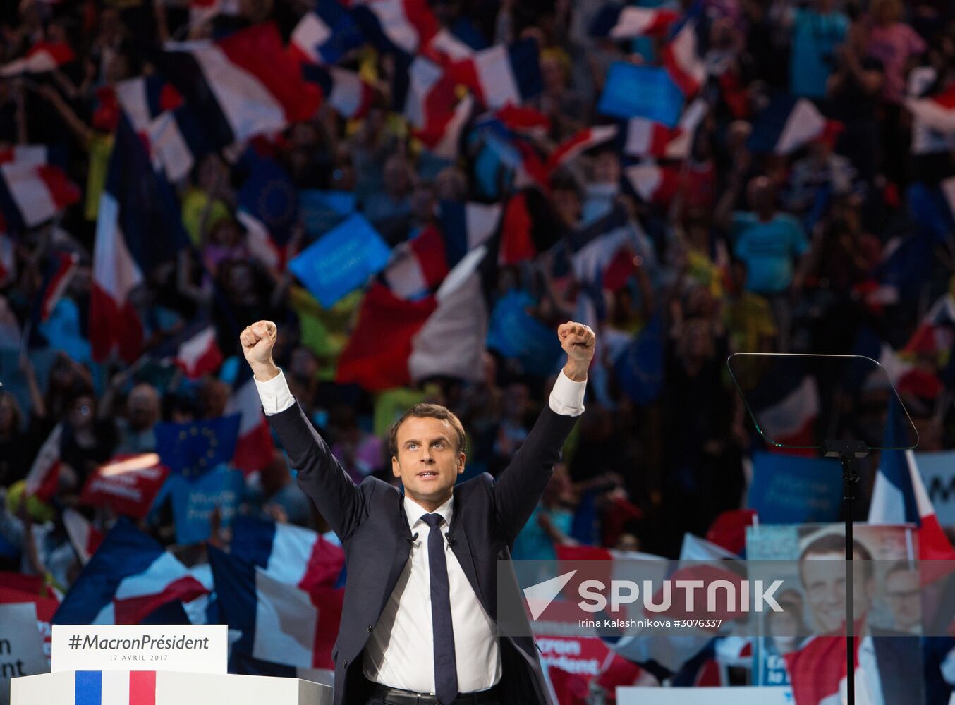 Emmanuel Macron meets with voters in Paris