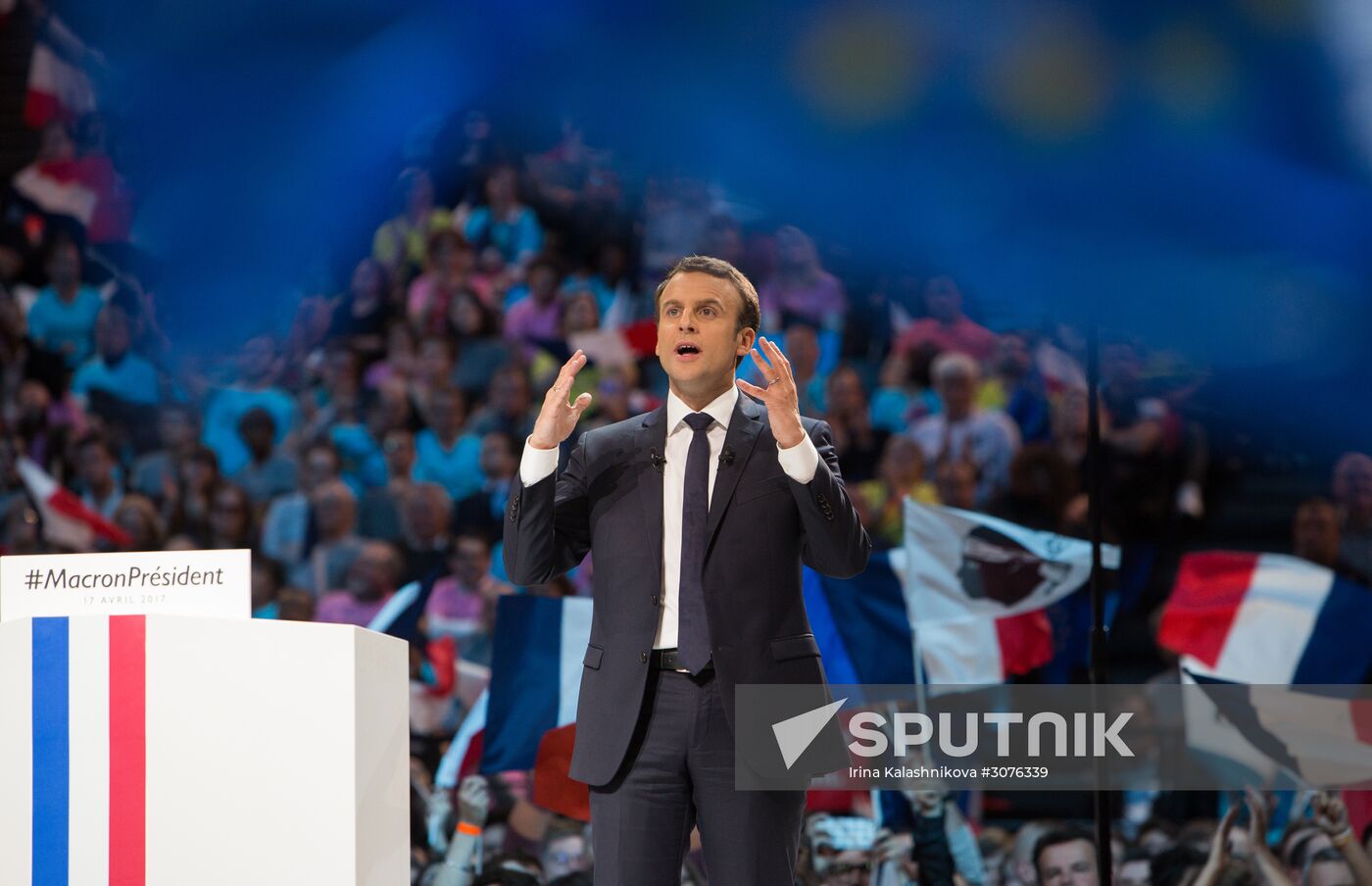 Emmanuel Macron meets with voters in Paris