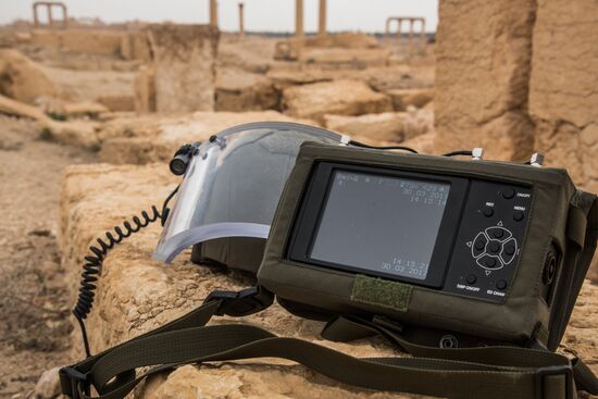 Russian mine pickers use new robotic systems during mine lifting in Palmyra