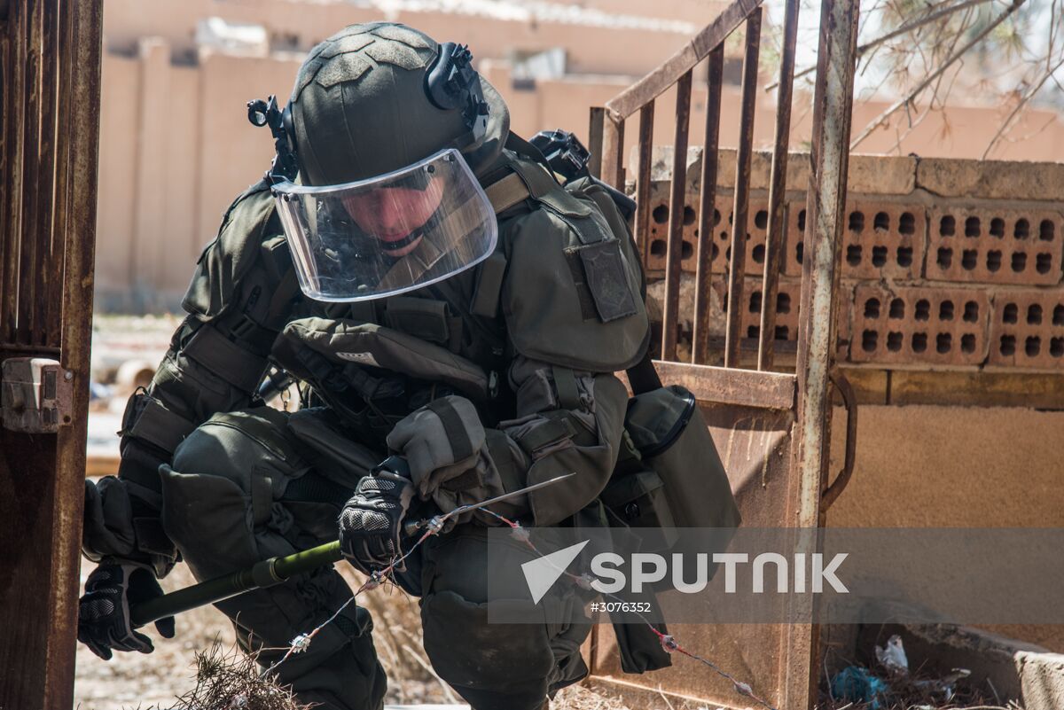 Russian mine pickers use new robotic systems during mine lifting in Palmyra