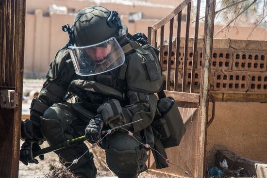 Russian mine pickers use new robotic systems during mine lifting in Palmyra