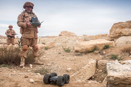 Russian mine pickers use new robotic systems during mine lifting in Palmyra