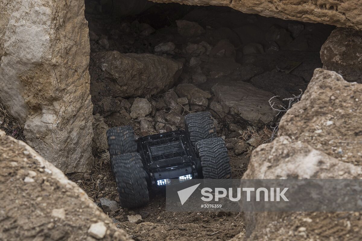 Russian mine pickers use new robotic systems during mine lifting in Palmyra
