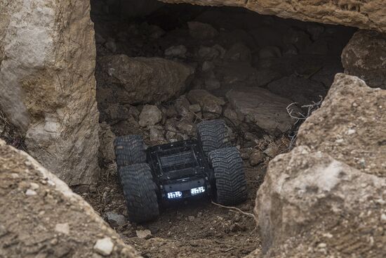 Russian mine pickers use new robotic systems during mine lifting in Palmyra