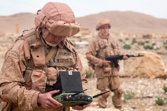 Russian mine pickers use new robotic systems during mine lifting in Palmyra