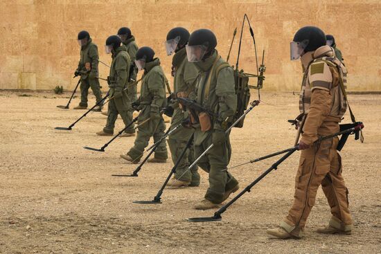 Russian mine pickers use new robotic systems during mine lifting in Palmyra