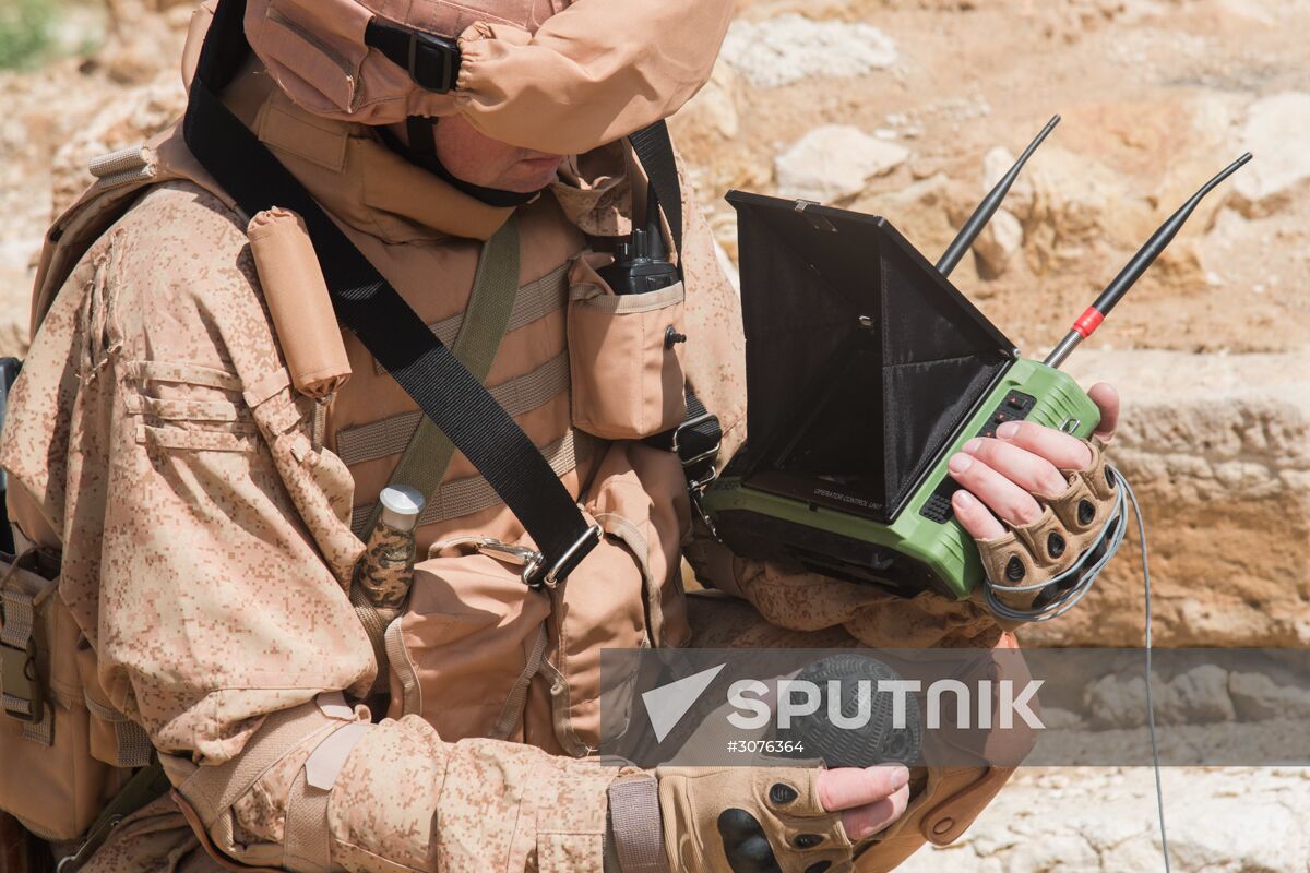 Russian mine pickers use new robotic systems during mine lifting in Palmyra