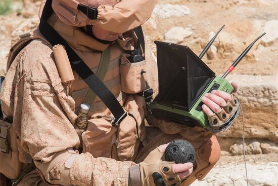 Russian mine pickers use new robotic systems during mine lifting in Palmyra