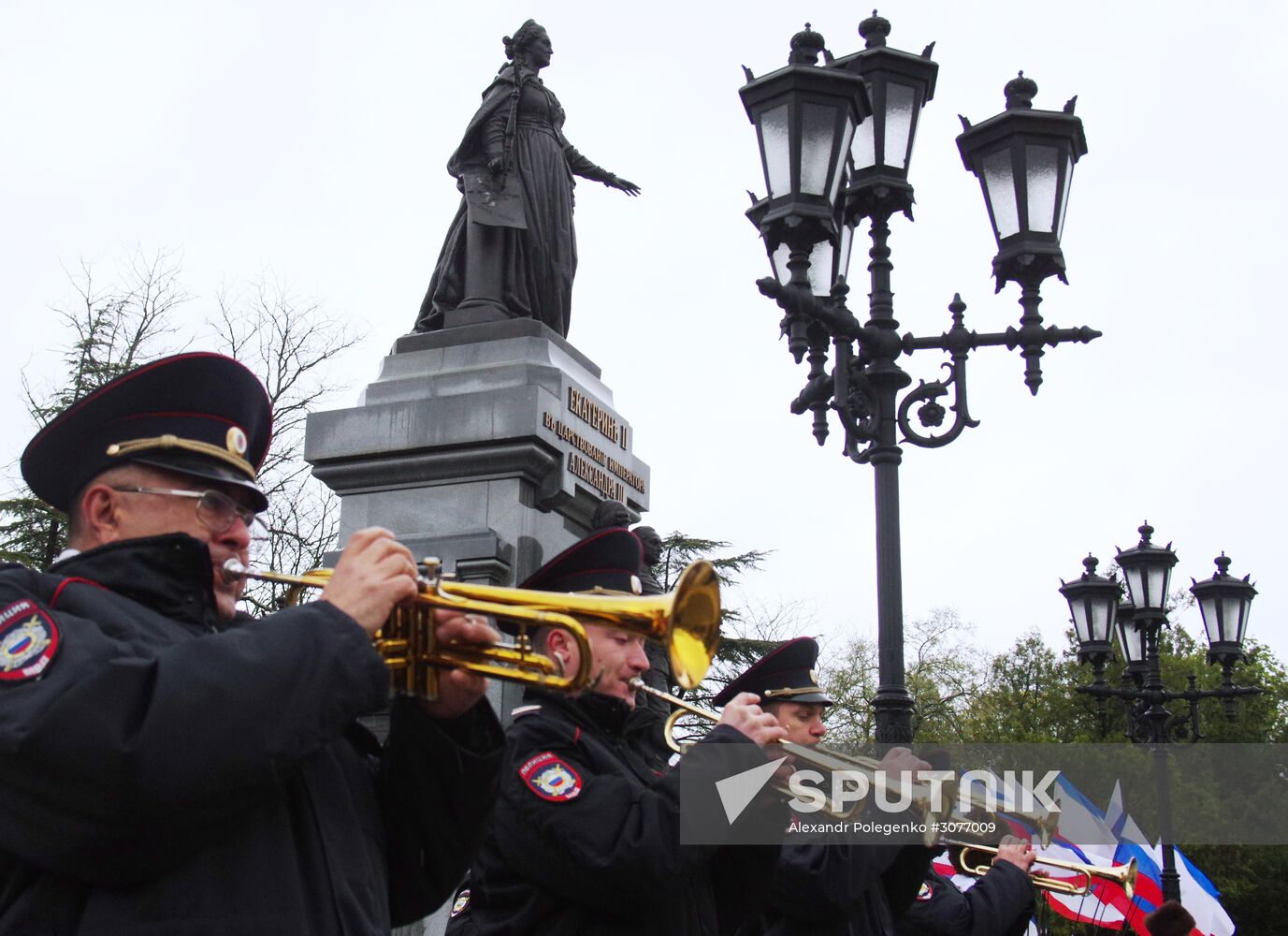 Laying flowers at Catherine the Great Monument in Crimea