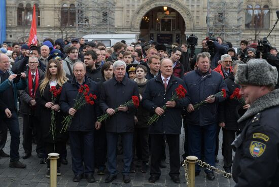 Flower-laying ceremony by Lenin's Mausouleum in Red Square