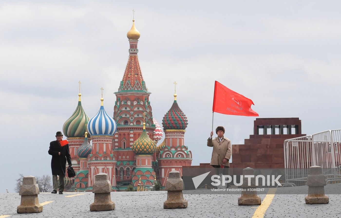 Flower-laying ceremony by Lenin's Mausouleum in Red Square