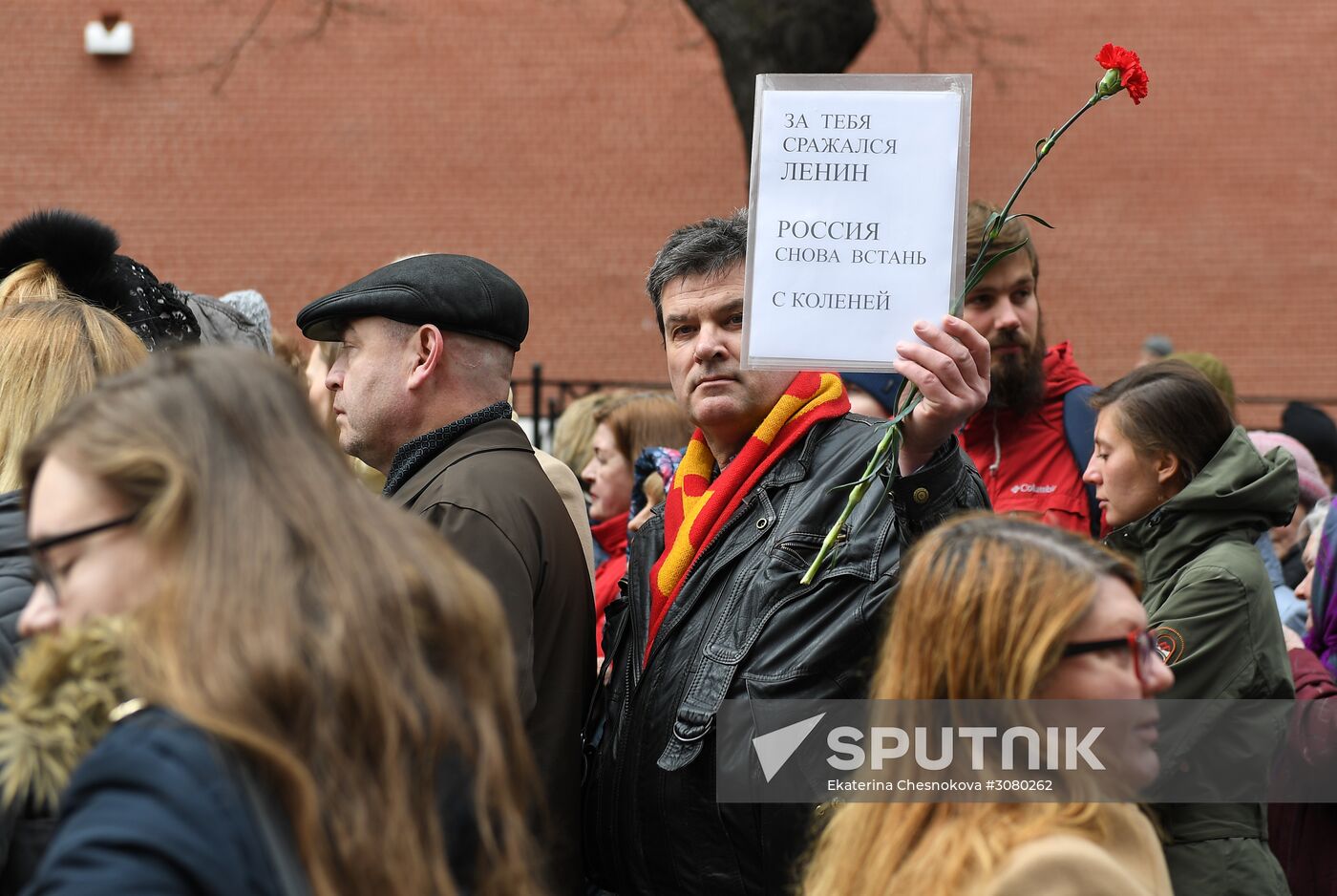 Flower-laying ceremony by Lenin's Mausouleum in Red Square
