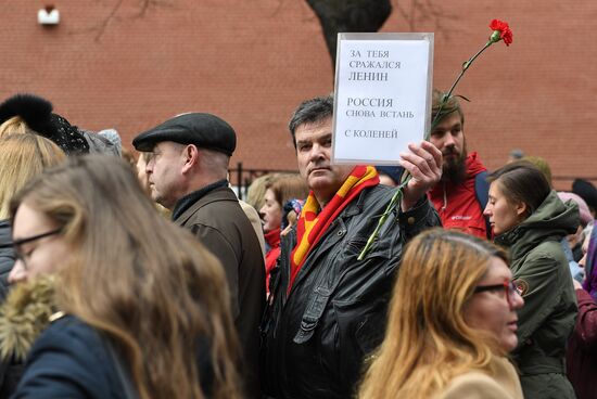 Flower-laying ceremony by Lenin's Mausouleum in Red Square