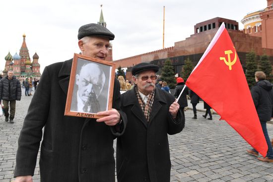 Flower-laying ceremony by Lenin's Mausouleum in Red Square