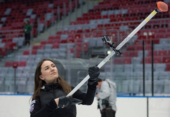 Formula 1 racing driver Daniil Kvyat plays curling