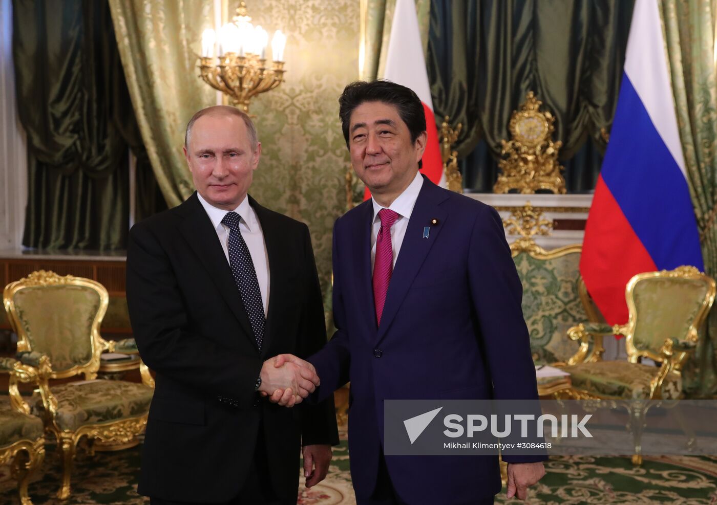 Russian President Vladimir Putin meets with Japanese Prime Minister Shinzo Abe
