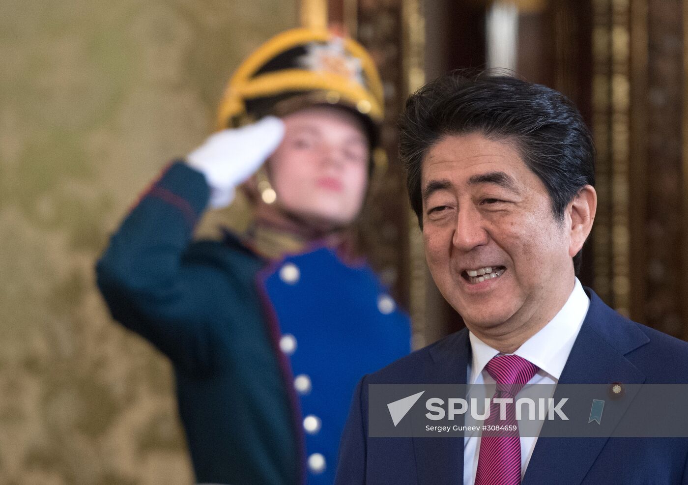 Russian President Vladimir Putin meets with Japanese Prime Minister Shinzo Abe