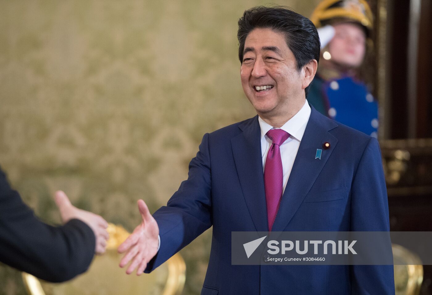 Russian President Vladimir Putin meets with Japanese Prime Minister Shinzo Abe