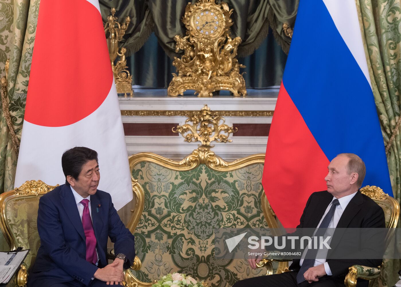Russian President Vladimir Putin meets with Japanese Prime Minister Shinzo Abe