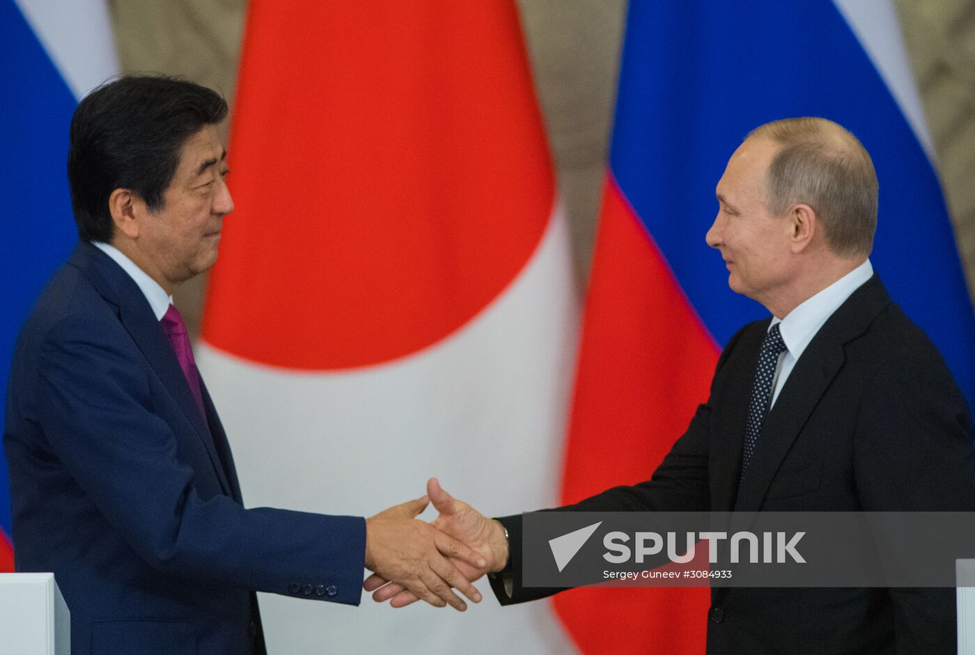 Russian President Vladimir Putin meets with Japanese Prime Minister Shinzo Abe