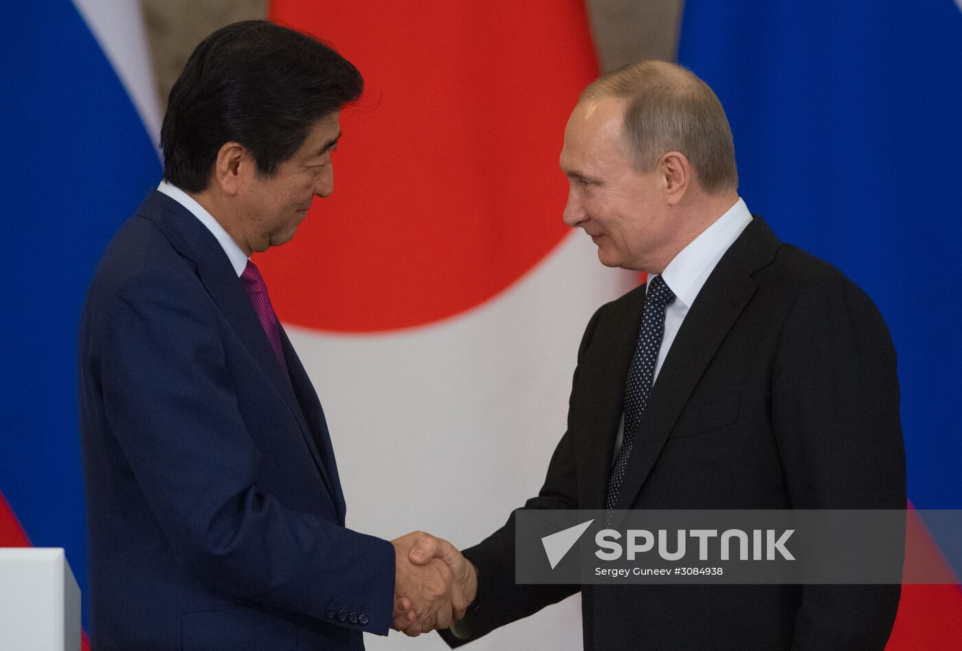 Russian President Vladimir Putin meets with Japanese Prime Minister Shinzo Abe