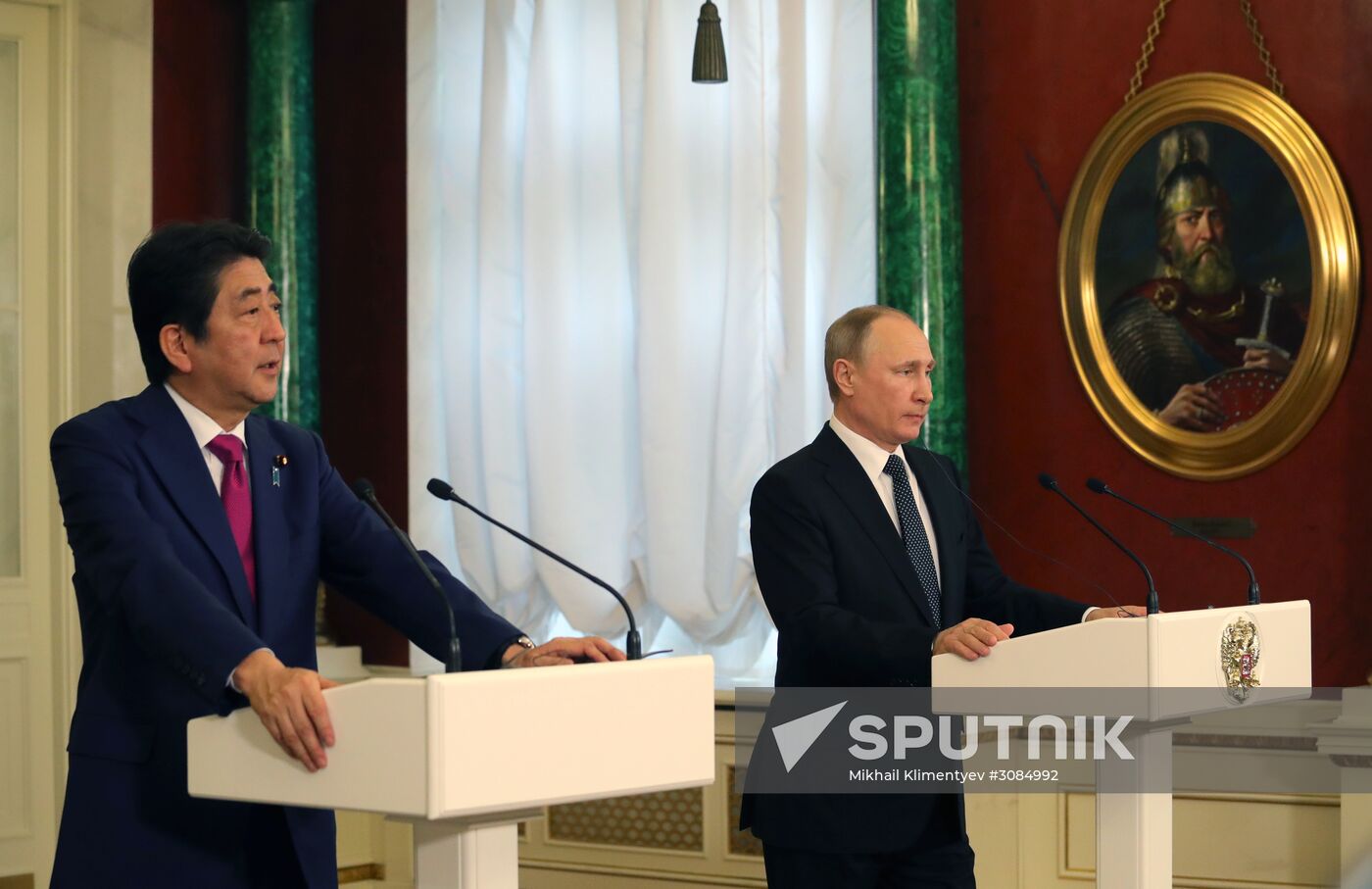 Russian President Vladimir Putin meets with Japanese Prime Minister Shinzo Abe