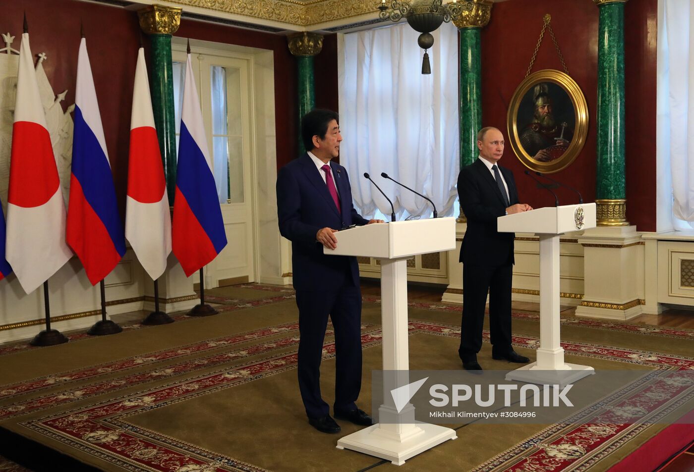Russian President Vladimir Putin meets with Japanese Prime Minister Shinzo Abe