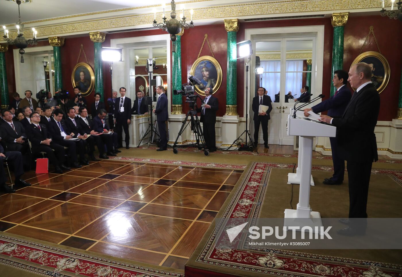Russian President Vladimir Putin meets with Japanese Prime Minister Shinzo Abe