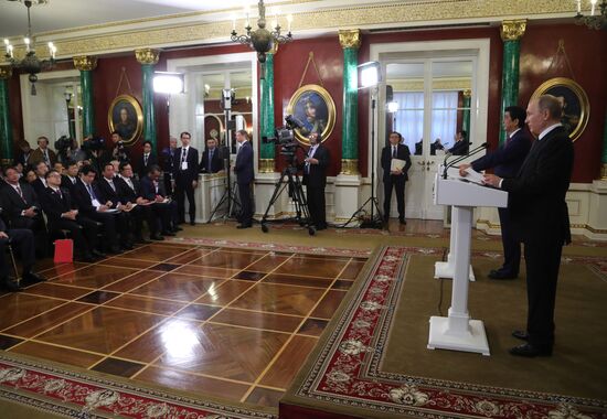 Russian President Vladimir Putin meets with Japanese Prime Minister Shinzo Abe