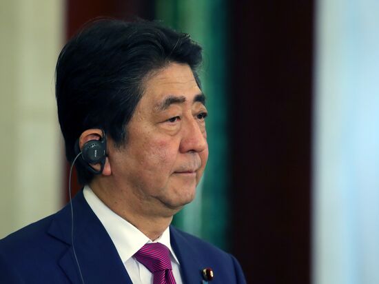 Russian President Vladimir Putin meets with Japanese Prime Minister Shinzo Abe
