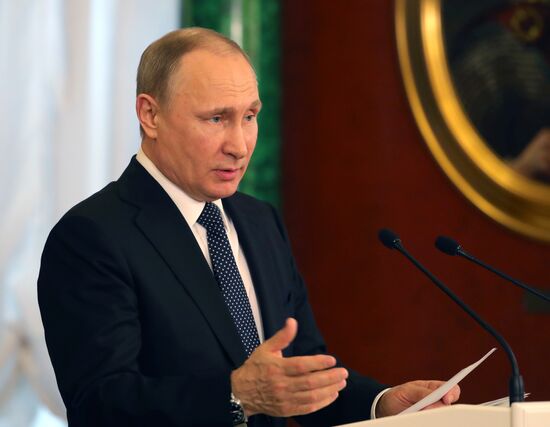 Russian President Vladimir Putin meets with Japanese Prime Minister Shinzo Abe