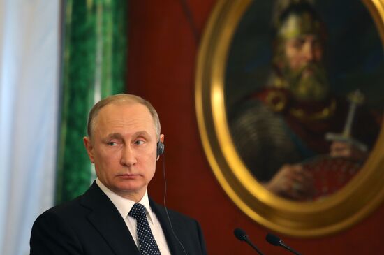 Russian President Vladimir Putin meets with Japanese Prime Minister Shinzo Abe