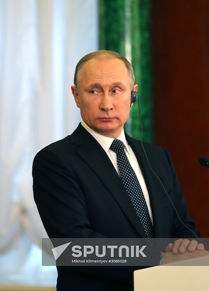 Russian President Vladimir Putin meets with Japanese Prime Minister Shinzo Abe