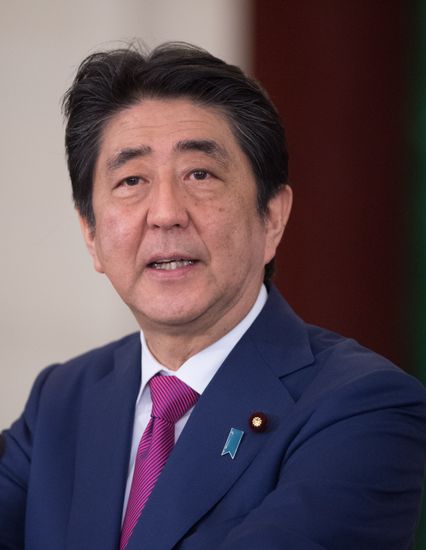 Russian President Vladimir Putin meets with Japanese Prime Minister Shinzo Abe