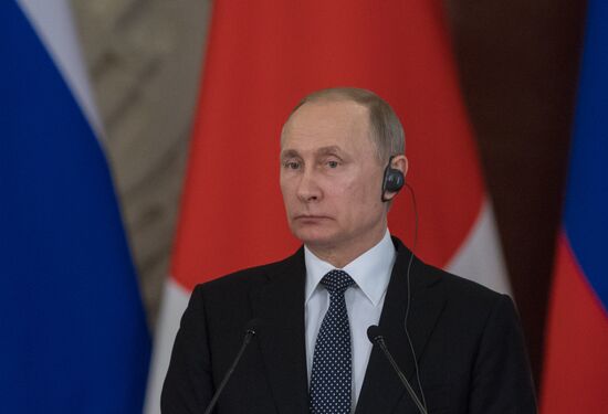 Russian President Vladimir Putin meets with Japanese Prime Minister Shinzo Abe