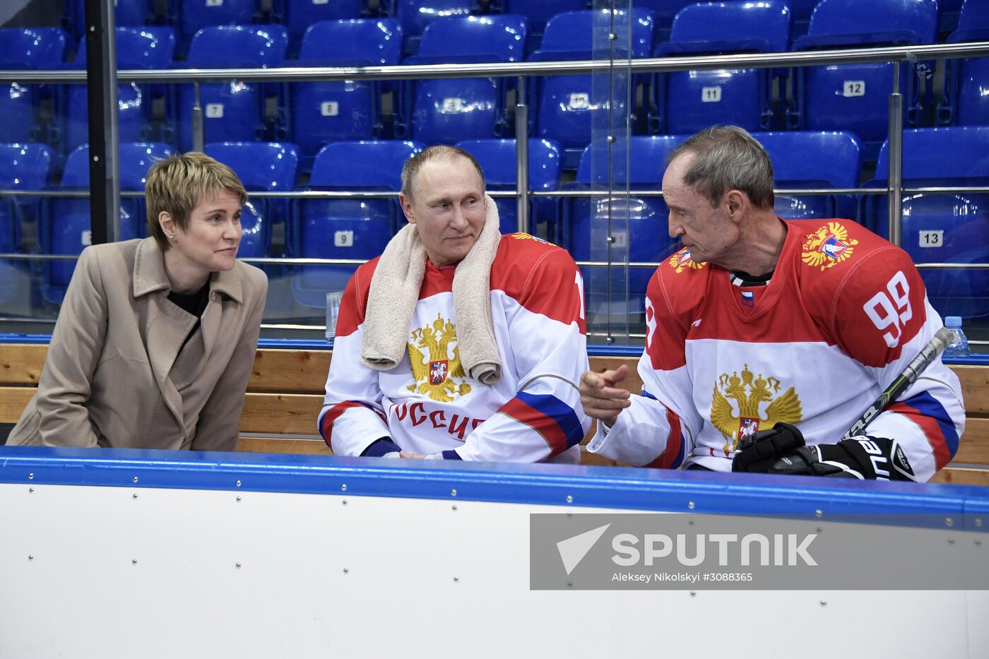 President Vladimir Putin takes part in hockey training session in Sochi