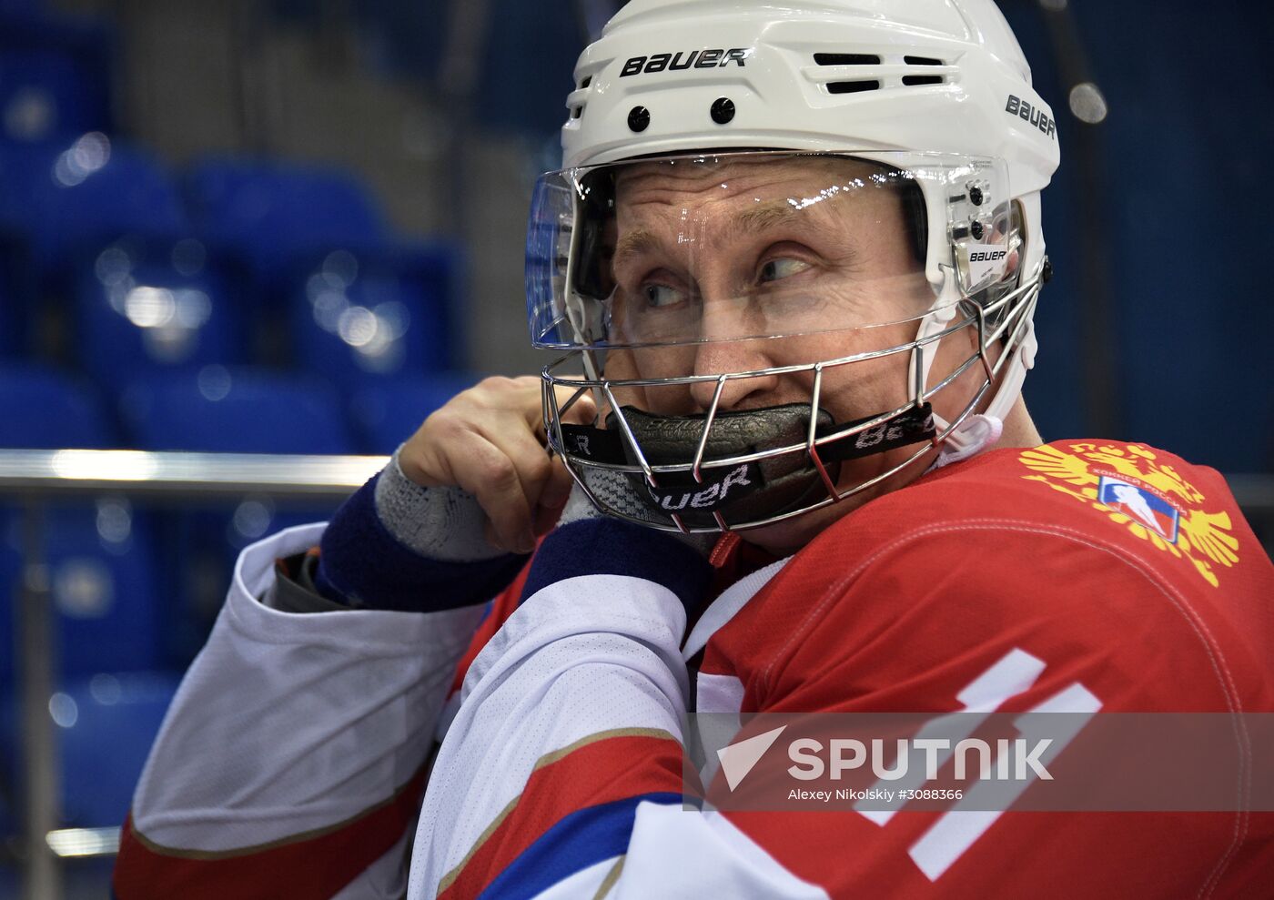 President Vladimir Putin takes part in hockey training session in Sochi